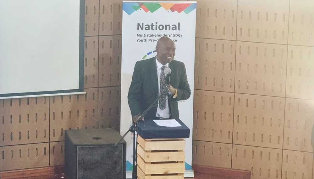 \"Global Peace Foundation Kenya Advocates for Youth Leadership in SDG Implementation at Pre-Conference 2023\" mr. daniel juma addressing the audience at the youth leadership in sdg implementation at pre conference